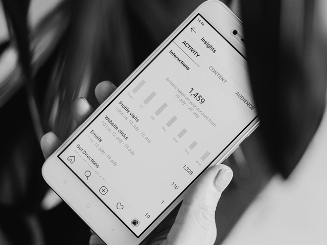 checking analytics on smartphone.