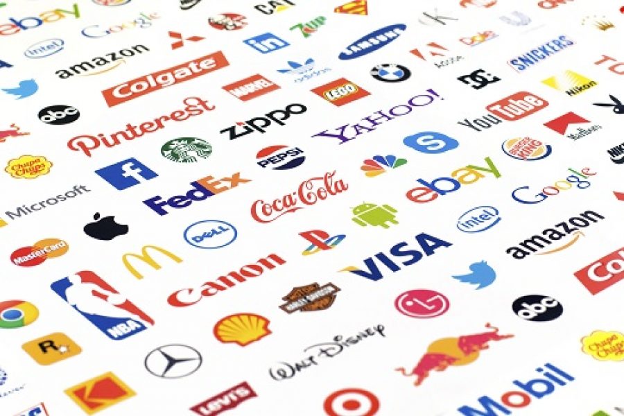 Zaporozhye, Ukraine - May 26, 2015: Photo of a logotype collection of well-known world brand's printed on paper. Include Coca-Cola, YouTube, Pepsi, Canon, McDonald's, Google, Facebook, Twitter, Apple and more others logo.