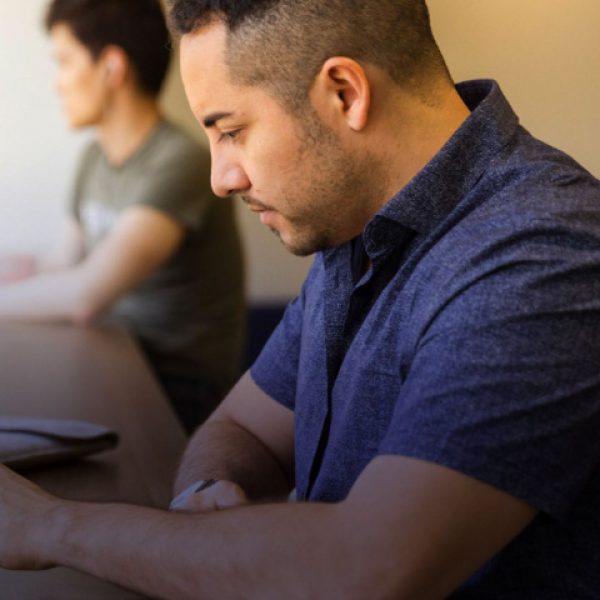 man working at laptop